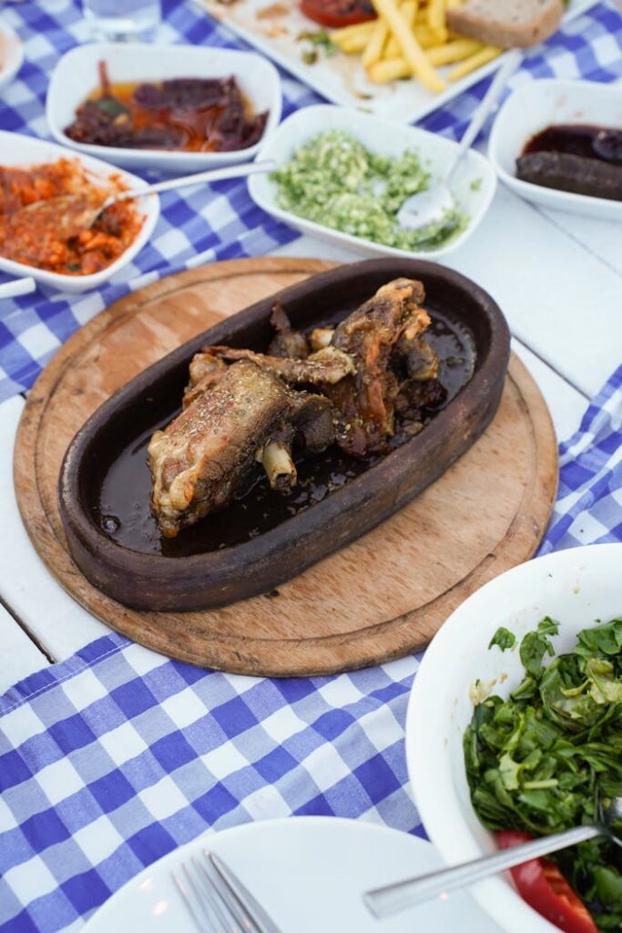 Delicious seafood platter at an outdoor taverna in Gökçeada, Türkiye. Enjoy authentic Turkish cuisine.